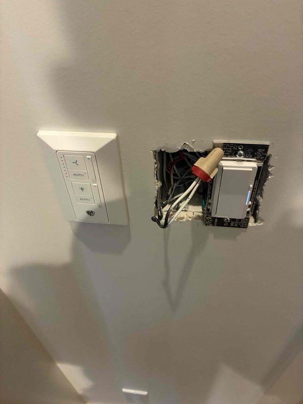Replaced CR2450 batteries in ceiling fan wall remotes for master bedroom and upstairs guest room locations. Reconnected master bedroom smart ceiling fan to Wi-Fi network using manufacturer's app with provided credentials. Verified proper operation of all fan controls and wireless connectivity upon completion.