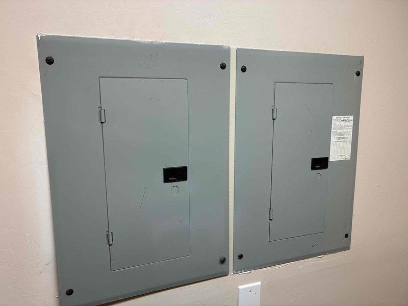 Completed annual electrical maintenance inspection as part of membership preventative maintenance program. Performed comprehensive safety inspection of dual electrical panel boxes, verifying proper circuit breaker operation, checking for signs of overheating or arcing, and ensuring all connections were secure. Inspected exterior electrical components including meter base, service entrance conduit, and weatherhead for proper installation and code compliance. All electrical systems found to be operating safely with no deficiencies noted at time of inspection.