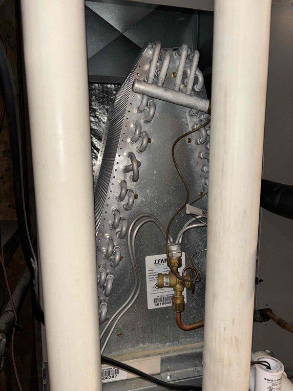Completed annual A/C tune-up and maintenance inspection on ground-level south-side air conditioning unit as part of membership preventative maintenance program. Performed comprehensive system evaluation including heat exchanger inspection, evaporator coil assessment, refrigerant line connections check, and verified all mechanical components for proper operation. Unit found to be functioning within normal parameters with no immediate repairs required.