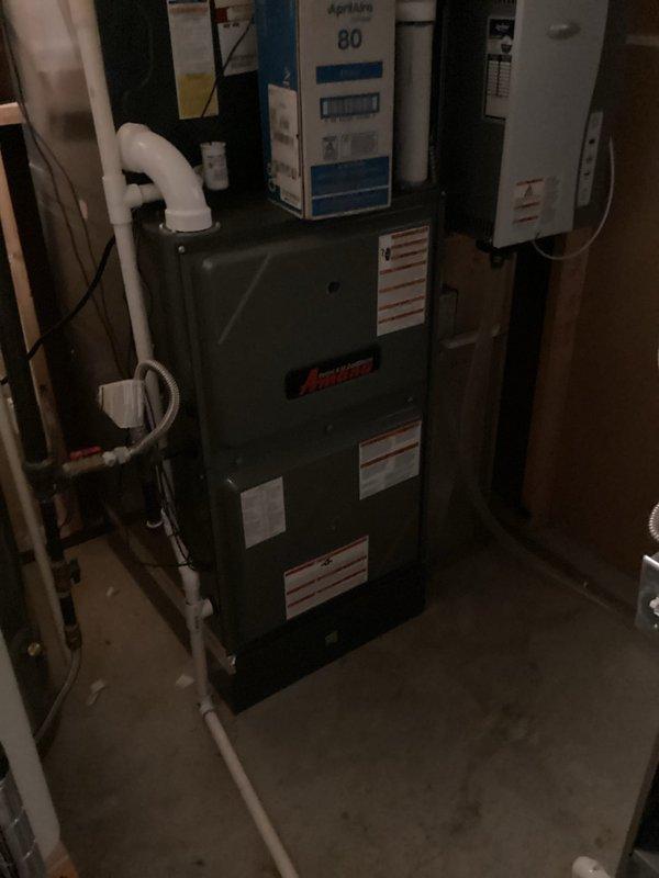 Completed preventive maintenance on a 4-year-old Amana furnace unit in accordance with membership plan requirements. Performed comprehensive heating system inspection including filter check, burner examination, heat exchanger evaluation, and safety control testing. Verified proper operation of ecobee smart thermostat displaying 71°F with system responding appropriately to programmed settings. All components found operating within manufacturer specifications with no reported issues or concerns from occupant.