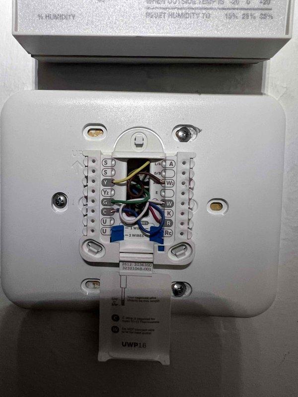 Installed S9V2B080U4PSBD 90% efficiency furnace in closet with existing 2" PVC venting maintained. Added 16x25x5 media cabinet (HCC16-2816) beneath furnace with MERV 11 filter, configuring return air to pull from bottom of unit. Relocated existing humidifier bypass from supply plenum to return air drop, disconnecting from previous furnace cabinet. Replaced failed condensate pump with new unit and installed X6670 T6 programmable thermostat with decorative beauty ring, utilizing existing 4-wire configuration from furnace. Performed system startup, verified proper operation of all components including humidifier integration, airflow through new media filtration, condensate drainage, and thermostat communication. All equipment tested and operating within manufacturer specifications.