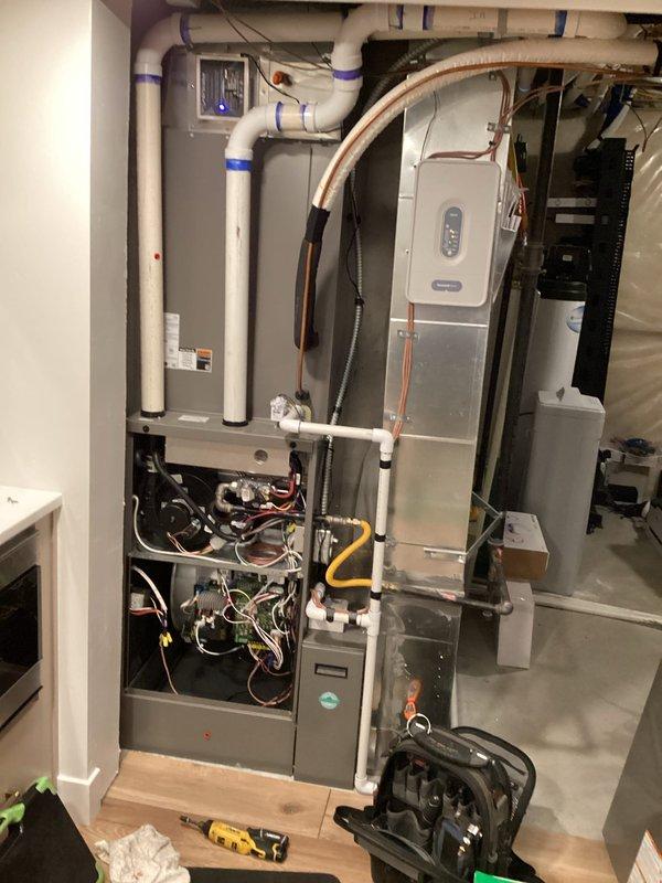 Completed annual maintenance on Lennox heat pump system as part of membership plan. Performed comprehensive inspection and tune-up of indoor furnace unit located in basement and outdoor condensing unit on south side of property. Verified all refrigerant lines, electrical connections, condensate drainage system, and ductwork operating within manufacturer specifications. System installed in 2024 and functioning properly with no issues identified during inspection.