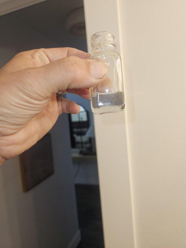 Replaced malfunctioning flow sensor on residential plumbing system located in basement. Verified system pressure readings using gauge assembly and confirmed proper operation of replacement sensor. Collected water sample for testing and documented pre- and post-repair pressure measurements to ensure optimal system performance.