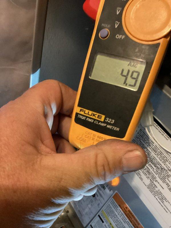Completed annual cooling maintenance on 14-year-old air conditioning system. Performed comprehensive inspection including amperage draw testing which measured 49 AAC, inspected dual run capacitor rated at 35x5.0uF 370VAC showing age-related surface corrosion and terminal discoloration, and evaluated all electrical connections and system components. Unit operating within normal parameters with no issues reported or found during maintenance visit.