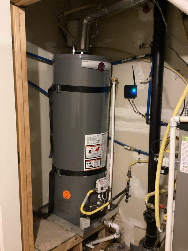 Completed comprehensive plumbing membership inspection of residential property. Inspected 1-year-old 50-gallon tanked water heater located in basement area, verifying proper installation including seismic strapping, gas line connections, venting system, and safety components. Evaluated sink fixtures and drain assemblies throughout property to ensure proper operation and identify any potential maintenance needs.