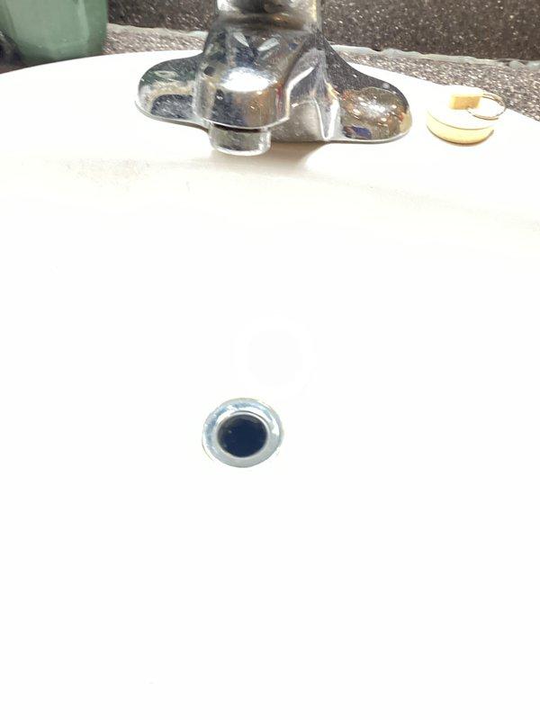 Completed comprehensive plumbing membership inspection of residential property. Inspected 1-year-old 50-gallon tanked water heater located in basement area, verifying proper installation including seismic strapping, gas line connections, venting system, and safety components. Evaluated sink fixtures and drain assemblies throughout property to ensure proper operation and identify any potential maintenance needs.