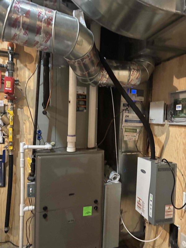 Completed annual Green Shield cooling maintenance on a 9-year-old residential HVAC system with furnace located in basement and outdoor condensing unit at ground level. Performed comprehensive inspection of indoor air handler, evaporator coil, and all associated ductwork and electrical connections. Inspected outdoor condensing unit including compressor, condenser coil, refrigerant lines, and electrical components. Verified proper operation of thermostat and control systems. All equipment found to be operating within normal parameters with no reported issues from customer at time of service. System maintenance completed per membership agreement specifications.