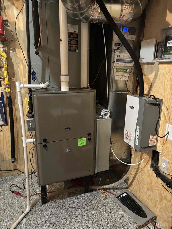 Completed annual Green Shield cooling maintenance on a 9-year-old residential HVAC system with furnace located in basement and outdoor condensing unit at ground level. Performed comprehensive inspection of indoor air handler, evaporator coil, and all associated ductwork and electrical connections. Inspected outdoor condensing unit including compressor, condenser coil, refrigerant lines, and electrical components. Verified proper operation of thermostat and control systems. All equipment found to be operating within normal parameters with no reported issues from customer at time of service. System maintenance completed per membership agreement specifications.