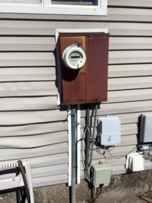 Completed annual electrical maintenance inspection as part of membership plan for residential property. Performed comprehensive visual inspection of exterior electrical service equipment including utility meter installation, junction boxes, conduit connections, and associated wiring. Verified proper mounting and connections of all exterior electrical components, inspected meter housing and enclosure for proper sealing, and confirmed conduit and cable routing met code requirements. All electrical systems found to be operating safely with no deficiencies noted.
