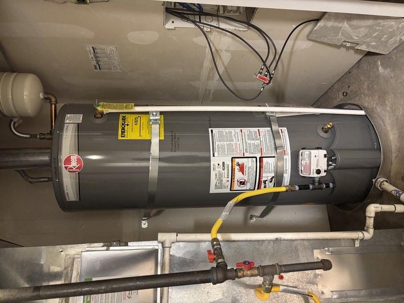 Completed non-member plumbing inspection including scheduled maintenance flush of tanked water heater located in basement mechanical area. Inspected water heater installation, connections, expansion tank, gas line, electrical components, and surrounding plumbing infrastructure to ensure proper operation and code compliance.