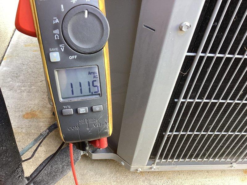 Responded to service call for 10-year-old Carrier air conditioning unit blowing warm air. Performed diagnostic evaluation of outdoor condensing unit using Fluke 902FC HVAC clamp meter to measure electrical current draw, recording amperage readings of 11.5A and 17.2A on system components. Conducted electrical testing and system performance analysis to identify root cause of cooling failure.