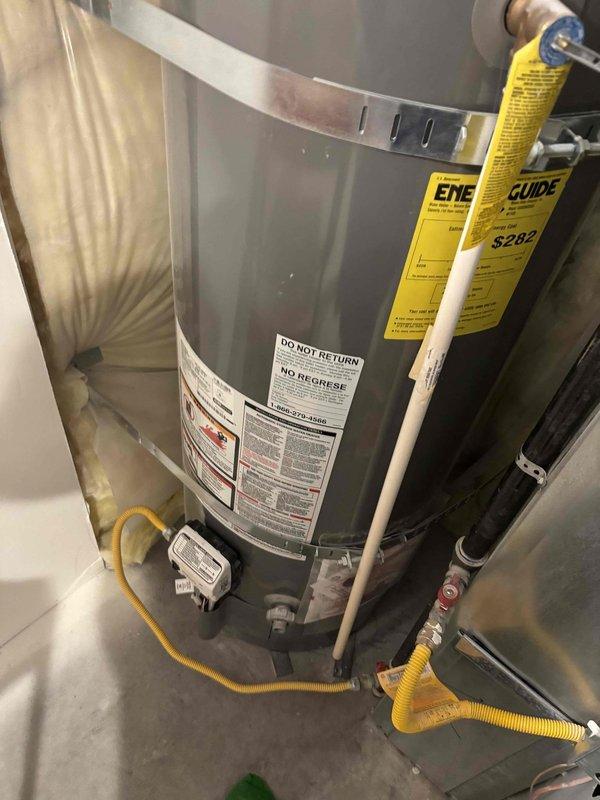 Responded to no hot water condition with red flashing diagnostic light on tanked water heater aged 6+ years. Found gas supply had been shut off and subsequently reconnected, but unit continued displaying single red flash error code. Inspected gas connections, verified proper gas flow through yellow flexible gas line, and examined control module and ignition system. Evaluated water supply connections, pressure relief valve, and all associated plumbing connections for proper operation. Documented equipment condition and diagnostic indicators for further troubleshooting recommendations.