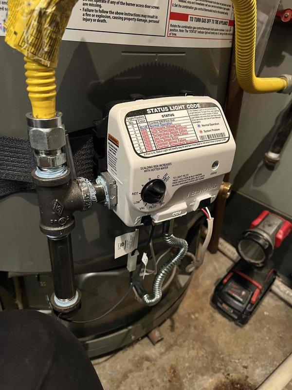 Responded to callback for 50-gallon natural gas tank water heater (Model PROH50S, 40,000 BTU) that was not functioning properly following recent service. Inspected gas control valve assembly, temperature settings, and status light diagnostic codes. Verified gas supply connections including chrome-plated shutoff valve and yellow flexible gas line routing. Assessed electrical connections and wiring to control valve. Documented water heater specifications showing unit manufactured in May 2022 and confirmed all safety warning labels present. Completed diagnostic evaluation of 4-year-old unit to determine cause of malfunction and restore proper operation.