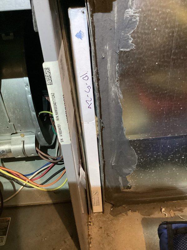 Completed comprehensive HVAC maintenance on a 10-year-old single-unit system including both air conditioning and furnace components. During cooling system inspection, discovered significant frost and ice buildup on evaporator coil indicating restricted airflow or low refrigerant charge; documented temperature reading of +130°F at condenser unit. Performed standard maintenance protocol on furnace unit in basement, inspecting electrical connections, wiring harness, and capacitor; all components functioning within normal parameters and no reported issues from homeowner at time of service.