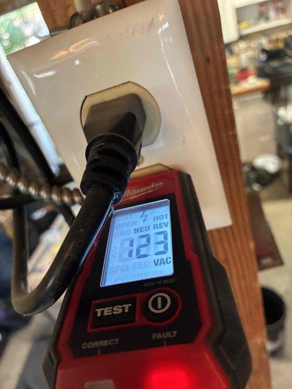 Completed annual electrical maintenance visit as part of ongoing membership preventative maintenance program. Performed comprehensive electrical system inspection including panel evaluation and outlet testing throughout the property. Tested interior and exterior receptacles using digital multimeter, verifying proper voltage, grounding, and polarity. Identified exterior outlet showing significant environmental deterioration with visible corrosion on mounting hardware and discoloration on receptacle face, indicating prolonged moisture exposure and weathering. All tested circuits showed correct 120 VAC readings with proper hot, neutral, and ground connections. Documented conditions with photographic evidence for maintenance records.
