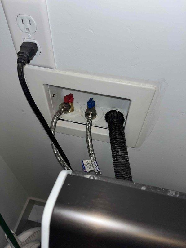 Completed annual plumbing maintenance inspection as part of membership plan. Performed comprehensive pressure test on water supply system, conducted water purity testing, and executed complete water heater flush. Inspected bathroom plumbing fixtures including chrome single-handle faucet and drain assembly at vanity sink with granite countertop, verified proper water flow and drainage. Examined laundry area plumbing connections including wall-mounted washing machine hookup with hot and cold water supply valves, braided stainless steel supply lines, and corrugated drain hose. All fixtures, connections, and plumbing systems found to be operating within normal parameters with no leaks or deficiencies noted.