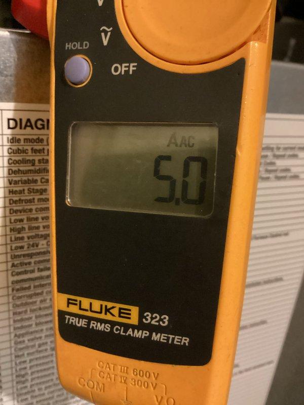 Completed scheduled heating maintenance on 10-11 year old Lennox furnace unit located in basement utility room. Performed comprehensive system inspection including electrical diagnostics, measured operating amperage at 50 AAC using clamp meter, verified all safety controls and combustion components functioning properly. System operating within manufacturer specifications with no issues reported or identified during inspection.