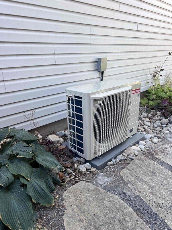 Completed full HVAC system replacement in basement closet, upgrading 80% efficiency furnace to new 80% efficiency unit model GRVT800803BNGXV6SS3610 with communicating side discharge air conditioning condenser unit CAPEA3626B3. Installed new Daikin Touch thermostat utilizing existing 4-wire configuration to control both furnace and condenser. Reused existing lineset after performing complete system flush to ensure proper refrigerant flow and system efficiency.

Mounted furnace on equipment base with 17" return air plenum for proper airflow. Connected existing 4" B-vent flex ductwork to new furnace exhaust outlet. Added 20x25x5 media cabinet equipped with MERV 11 filter for enhanced air filtration. Positioned outdoor condenser unit on 24x36x3 equipment pad with proper clearances and secured all refrigerant line connections.

Verified all electrical connections at disconnect box, thermostat, and equipment terminals. Tested system startup sequence, confirmed proper communication between th