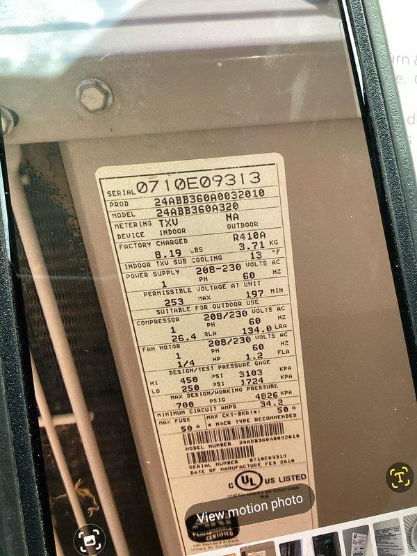 Responded to callback for system blowing warm air with no cooling capability. Inspected indoor unit and found blower wheel heavily contaminated with dust and debris accumulation, restricting airflow and system performance. Documented equipment specifications and current condition with photos for service records.