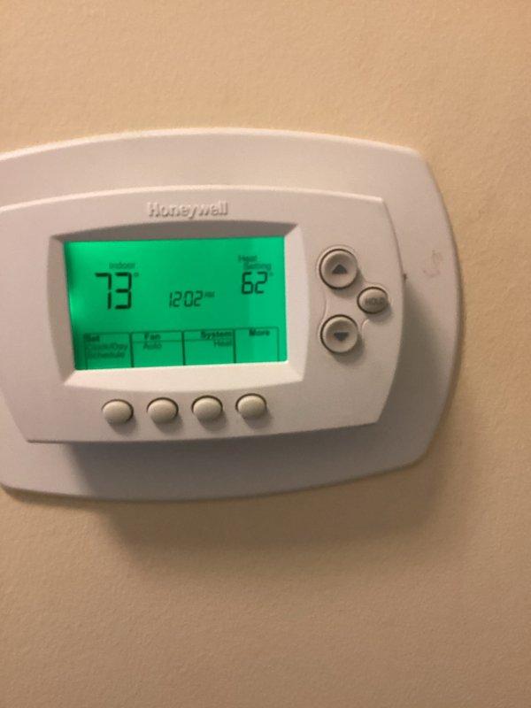 Completed comprehensive Green Shield heating and cooling maintenance on a single-zone residential HVAC system with a 13-year-old air conditioning unit and 8-year-old furnace. Performed super tune-up service including full system inspection, filter evaluation, electrical connection testing, and thermostat calibration verification on Honeywell programmable unit. Inspected furnace combustion components, gas line connections, PVC venting system, and confirmed proper operation of all safety controls and heating elements in basement installation. Evaluated outdoor AC unit, checked refrigerant levels, cleaned condenser coils, and verified proper system cycling. All equipment operating within manufacturer specifications with no immediate repairs required.
