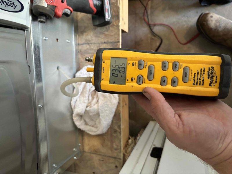 Completed preventative maintenance tune-up on a 3-4 year old Rheem furnace located in garage closet. Performed comprehensive system inspection including visual examination of heat exchanger, burner assembly, and all gas line connections. Tested and verified proper operation of gas valve, ignition system, and flame sensor. Conducted electrical diagnostics using digital multimeter to check voltage and amperage readings on blower motor and control board. Inspected all supply and return ductwork connections for proper sealing. Verified proper venting and combustion air supply. System operating within manufacturer specifications with no issues identified at time of service.
