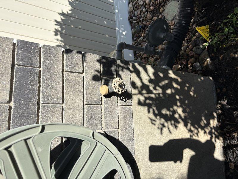 Completed annual plumbing maintenance inspection including system pressure test, water purity analysis, and water heater flush on 8.5-year-old American Standard 40-gallon unit. Inspected accessible plumbing infrastructure in crawlspace including copper supply lines, shut-off valves, and pipe insulation, as well as exterior irrigation and drainage system components near foundation.