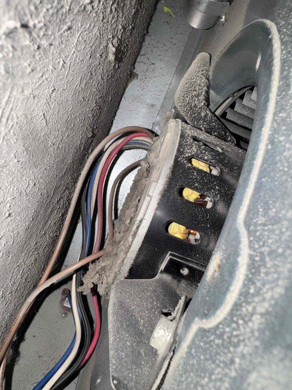 Responded to no-heat call for natural gas furnace with repeated clicking but no ignition. Upon arrival, verified unit was receiving proper electrical power following utility company repair of external power issue. Conducted diagnostic testing and found heavy dust and debris accumulation at electrical connection points and terminals. Cleaned all electrical connections and terminals, removing significant buildup that was preventing proper circuit completion. Tested temperature differential at supply register and confirmed proper airflow. Cycled unit through multiple heating cycles to verify igniter operation, flame sensor response, and burner ignition sequence. Furnace now operating within normal parameters with consistent ignition and proper heat output.