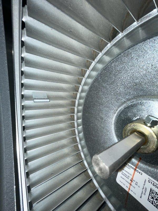 Completed annual maintenance on dual-zone HVAC system consisting of two furnaces (one downstairs, one in garage) and two outdoor A/C units located on south side of residence. Inspected centrifugal blower assemblies, verified proper operation of squirrel cage fans, and confirmed all components were clean and functioning within normal parameters. Measured and recorded system pressures at 0.24 psig, indicating proper refrigerant charge and system balance across both zones.