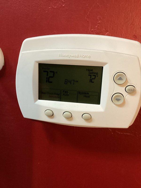 Completed annual heating maintenance on 2-year-old furnace system located in garage. Performed comprehensive tune-up including inspection of all major components, burner assembly, heat exchanger, and ductwork. Verified proper operation of Honeywell Home digital thermostat with system set to heat mode at 72°F. Inspected ductwork and confirmed adequate airflow throughout system. No issues reported by customer and unit operating within normal parameters upon completion of preventative maintenance service.