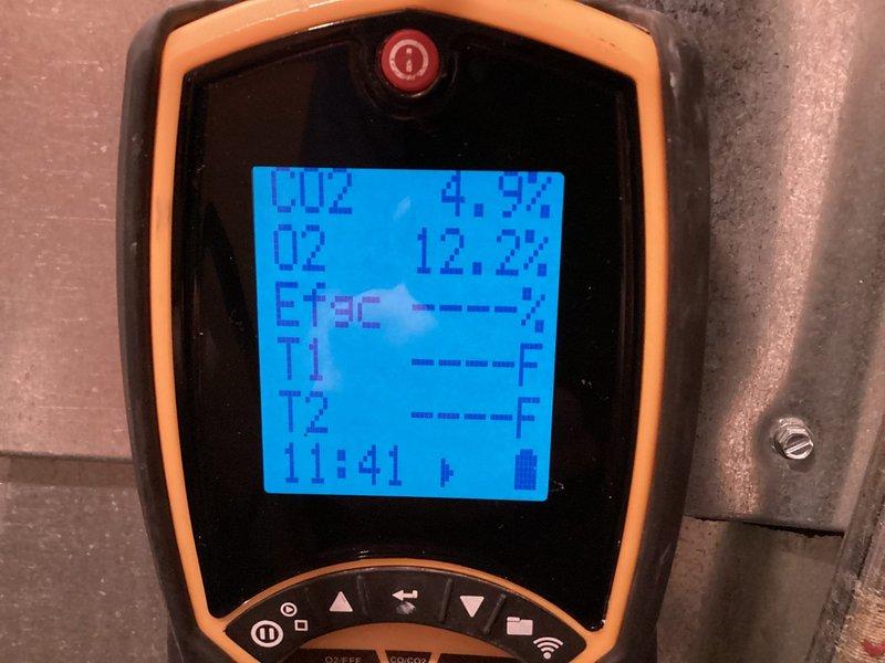 Completed comprehensive heating maintenance on 14-year-old furnace system located in basement as part of membership plan. Performed thorough inspection including internal ductwork examination using digital camera to investigate previous home inspector's notation of rust indicating potential historical leak. Conducted combustion analysis and efficiency testing, recording oxygen levels, temperature differentials, and system performance metrics. All readings within normal operating parameters with no active leaks or safety concerns identified at time of service.