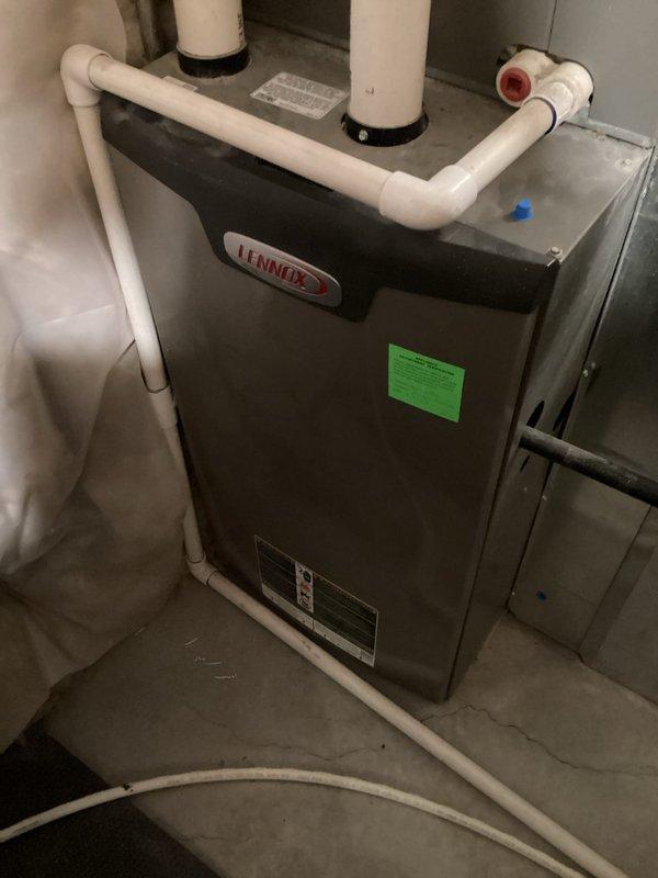Performed a complete seasonal maintenance inspection on a 9-year-old Lennox gas furnace, including visual inspection of the condensate drain and PVC venting/combustion air piping, with no signs of leaks, corrosion, or rust. Tested electrical components with a multimeter, recording a resistance reading of 55.6 ohms, and reviewed the furnace status code panel to verify proper system operation. No issues were reported by the customer, and the equipment was found in good working condition.