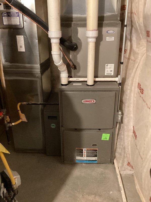 Responded to a no-heat call on a 6–9 year old Lennox gas furnace. Inspected the unit and removed the access panel to evaluate the burner compartment, gas valve assembly, pressure switch, venting, and control wiring, and found the equipment intact with no visible rust, frost, or damage. Documented system condition with photos.