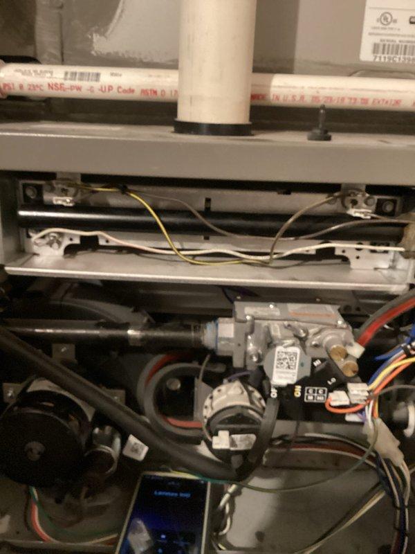 Responded to a no-heat call on a 6–9 year old Lennox gas furnace. Inspected the unit and removed the access panel to evaluate the burner compartment, gas valve assembly, pressure switch, venting, and control wiring, and found the equipment intact with no visible rust, frost, or damage. Documented system condition with photos.