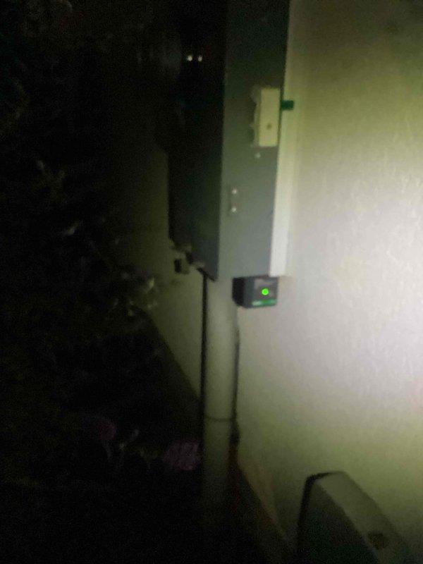 Performed a Green Shield electrical membership inspection, including a visual assessment of the exterior service equipment, utility meter enclosures, conduit runs, and wall-mounted electrical units. Documented the condition of the enclosures and inverter unit with photos, noting dust and sand accumulation inside an open, empty enclosure and minor surface wear on the metal housings. Reported doorbell-to-speaker connection concerns were reviewed as part of the visit.