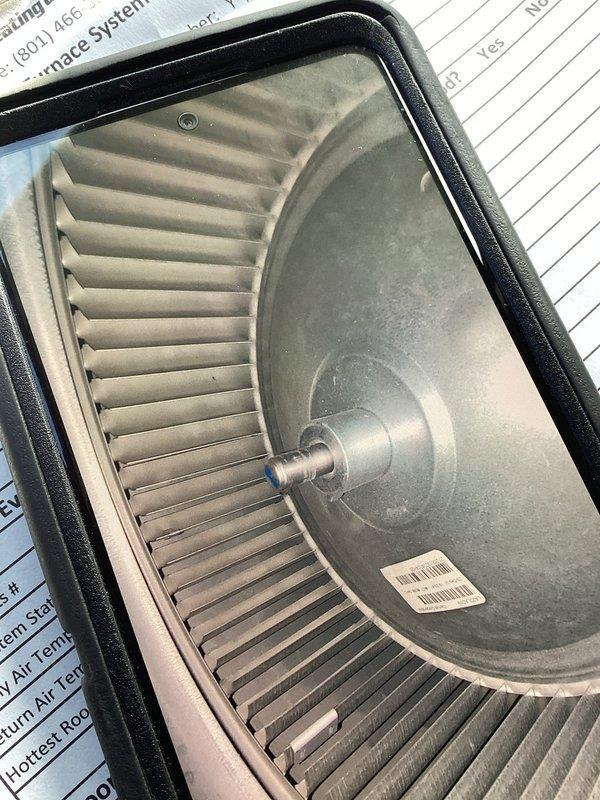 Performed annual furnace tune-ups on two 3-year-old units, both covered under the membership plan, with no issues reported. Inspected and cleaned the blower assemblies, removing dust buildup from the blower wheel and housing. Tested electrical components with a true RMS clamp meter and recorded system data, including serial numbers, filter MERV rating, and return air and room temperature readings. Both systems checked out and were left in proper operating condition.