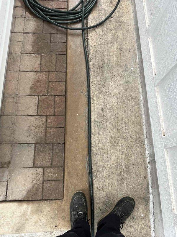 Responded to a recall for recurring basement drain backups, with wastewater slowly rising throughout the lower level approximately two weeks after the prior service. Used a RIDGID SCOUT locator in wet conditions along the exterior walkway to trace and pinpoint the underground drain line path for further evaluation. Findings were documented with photos, and the recall is being reviewed with the team to coordinate next steps for corrective repair.