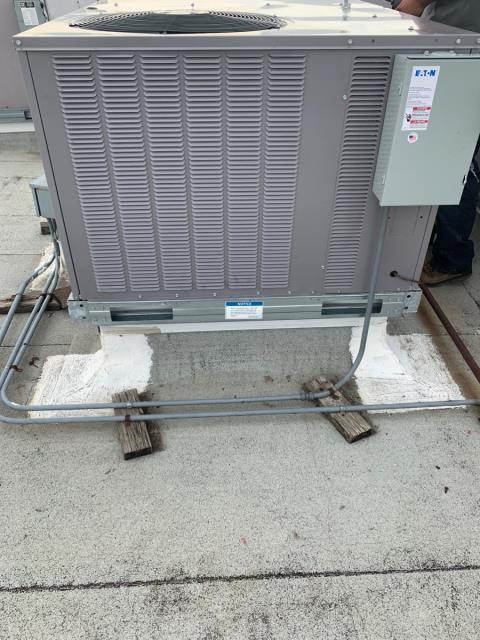 Replaced rtu on a commercial building.  With a new Carrier ac unit, and disconnect  at Dallas Love Field Airport