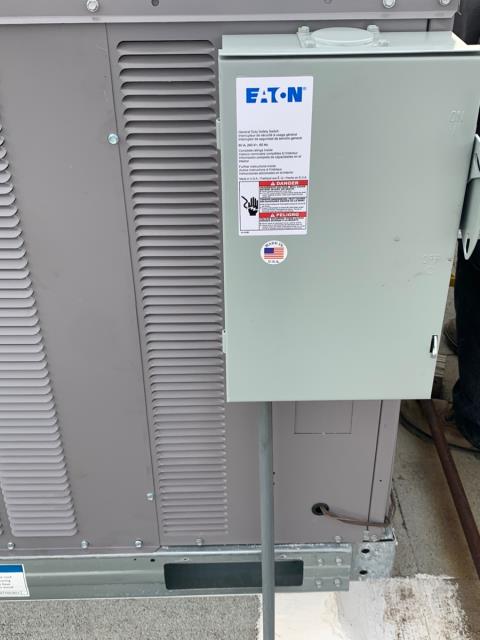 Replaced rtu on a commercial building.  With a new Carrier ac unit, and disconnect  at Dallas Love Field Airport