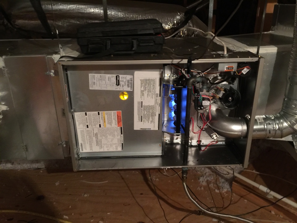 Performing startup and safety test of new gas furnace in Fairview, TX