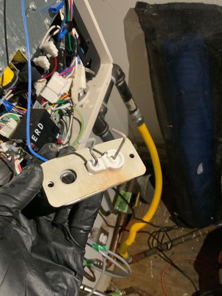 Noritz tankless water heater very dirty and pitted igniter