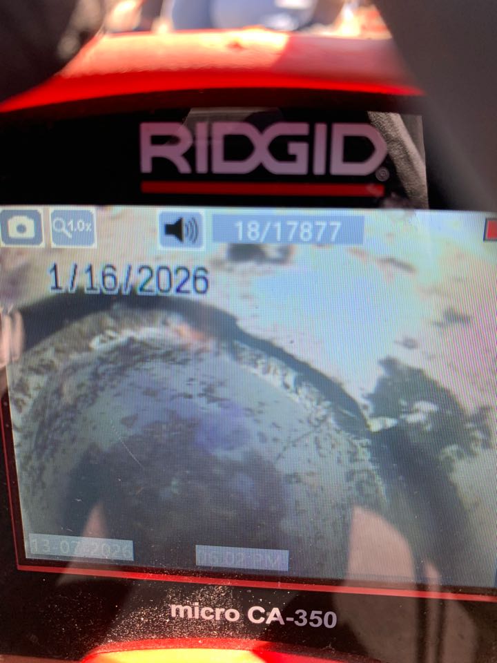 Camera inspected whole house waste system and found separation/broken PVC sewer pipe under home