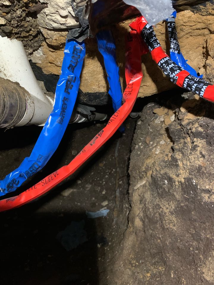 Installed new copper waterlines under slab house. Tunnel under home to expose damaged water lines.