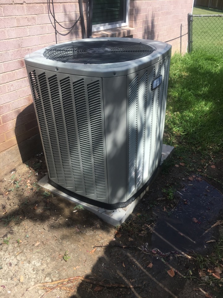 Performing an AC tune up on one Trane system 