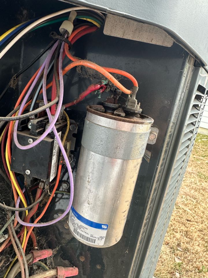 Performing a minor repair on one Trane system 