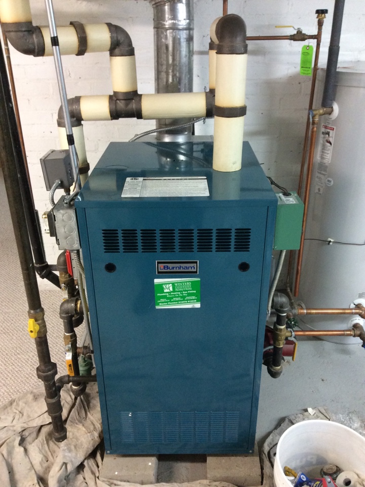 Clean, service and flush burnham steam boiler