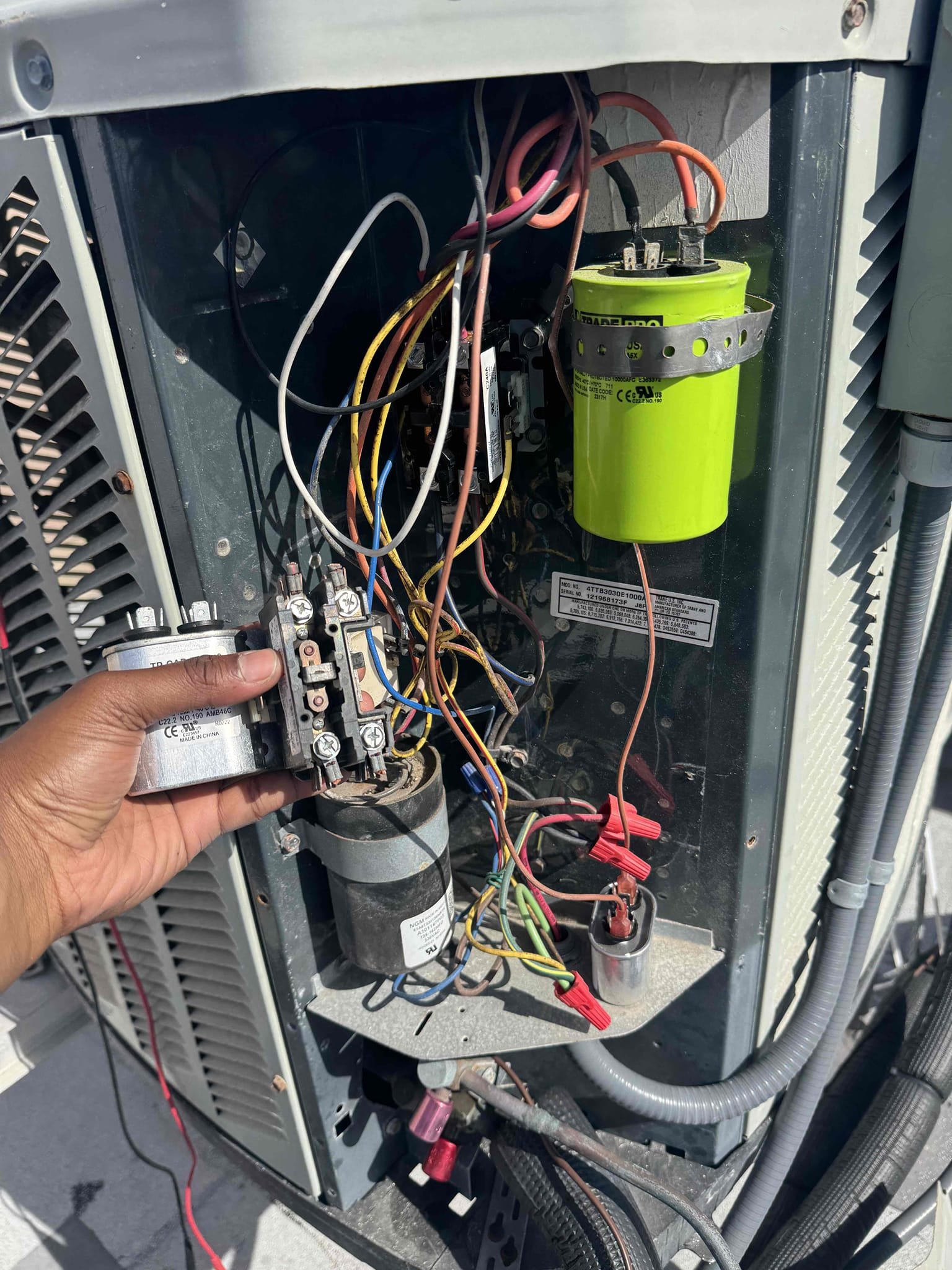 For condenser on roof- contactor is pitted with high resistance. Capacitor is weak. Allowing the system to run with a pitted contactor can damage the compressor with voltage drops. Fan motor has to work harder to start with weak capacitor.

Replaced contactor and capacitor. Tested system function after repair. 