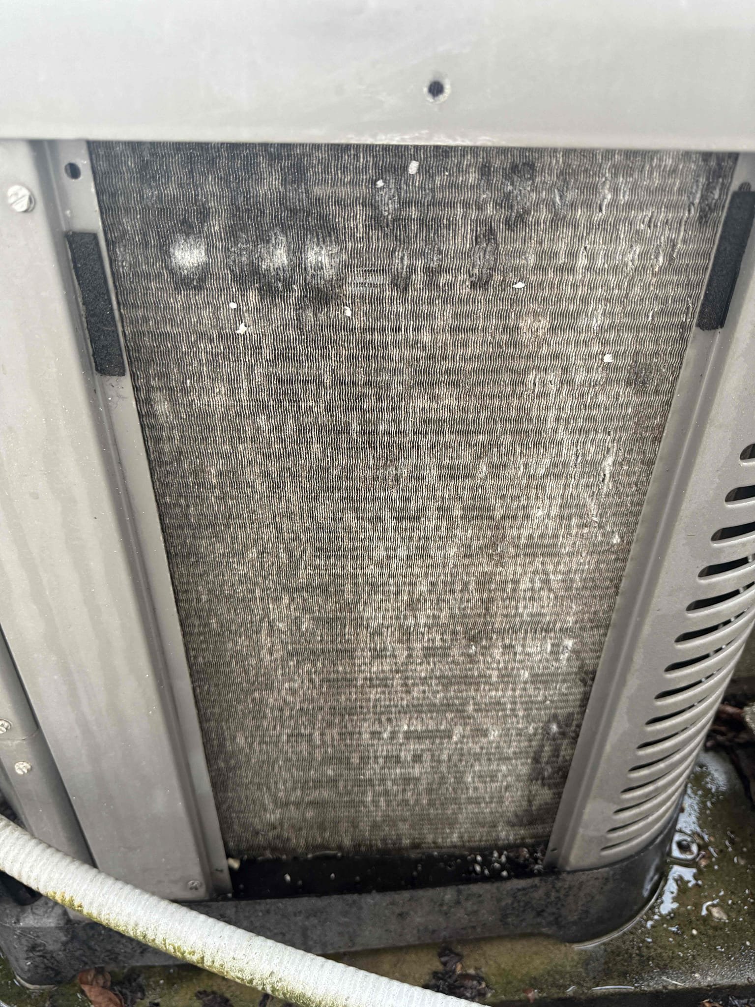 Upon my inspection, found system had 27 psi of refrigerant. Performed leak search and found leak. Repaired leak on copper refrigerant line inside condenser unit that connects to the pressure switch. Cleaned condenser coils. Strapped up loose wires inside the condenser. Installed/welded on new liquid line filter dryer. Put system under a vacuum and charged system with 8lbs of virgin 410a refrigerant. Achieved a 20° temperature split and a 13° subcool. System is cooling properly at this time. 

Included 2lbs refrigerant complimentary. 
Cleaned condenser coils complimentary