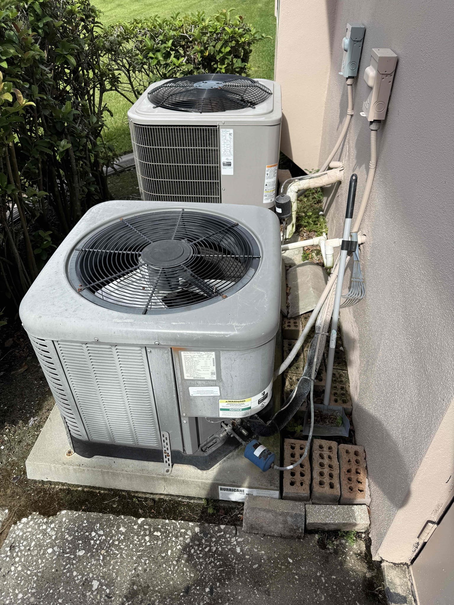 Upon my inspection, found system had 27 psi of refrigerant. Performed leak search and found leak. Repaired leak on copper refrigerant line inside condenser unit that connects to the pressure switch. Cleaned condenser coils. Strapped up loose wires inside the condenser. Installed/welded on new liquid line filter dryer. Put system under a vacuum and charged system with 8lbs of virgin 410a refrigerant. Achieved a 20° temperature split and a 13° subcool. System is cooling properly at this time. 

Included 2lbs refrigerant complimentary. 
Cleaned condenser coils complimentary