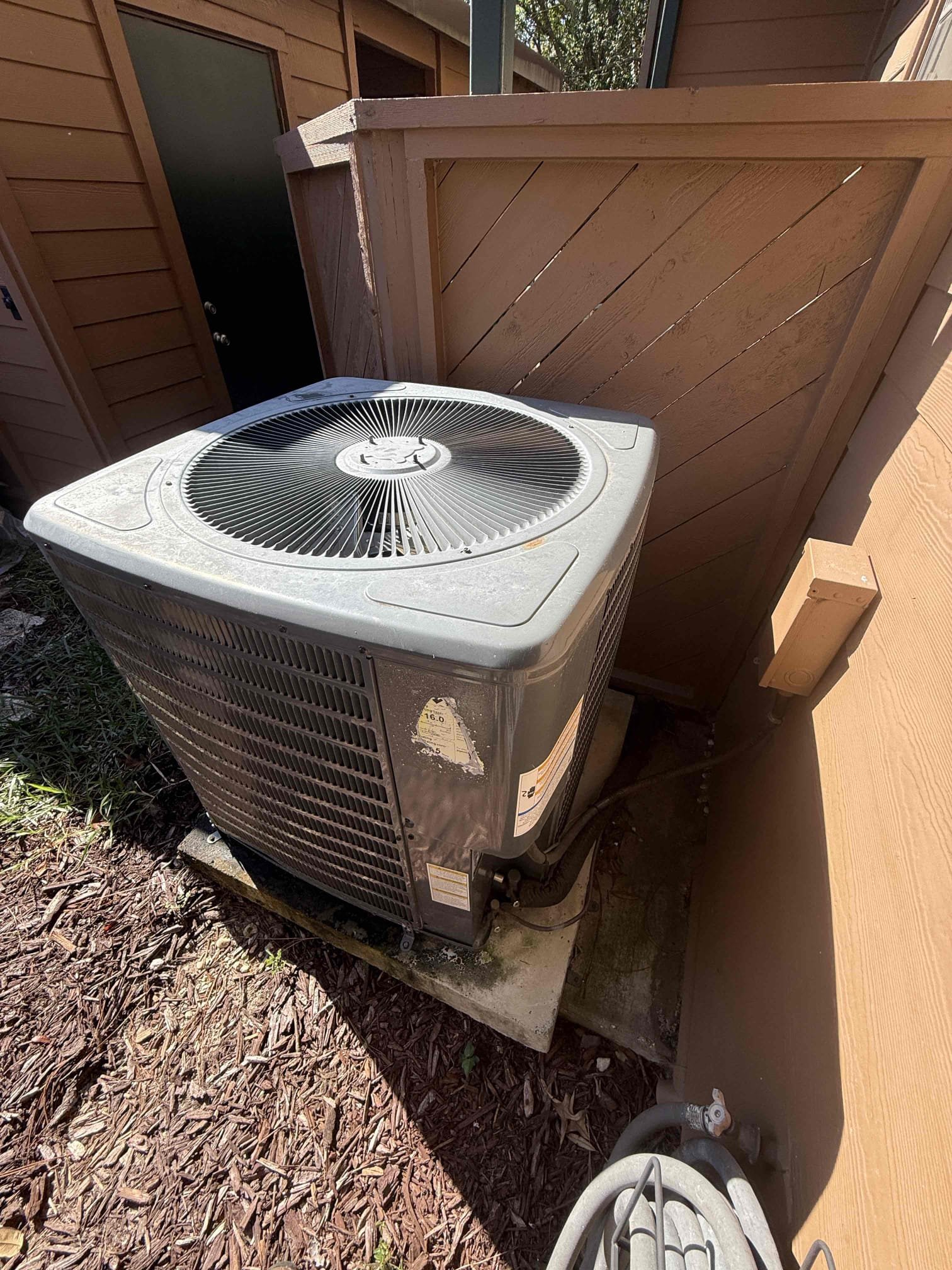 Upon my inspection, found indoor blower motor is not working. Verified high voltage and low voltage is supplied to the motor however the motor is not engaging. System is not cooling at this time and client requested to leave door panels off of unit. 
Quotes sent for blower replacement as well as system replacement with new warranties. 

Blower replacement requires extensive labor to remove due to poor serviceability access. Coil may need to be removed if motor cannot be detached from the blower housing within the unit. 