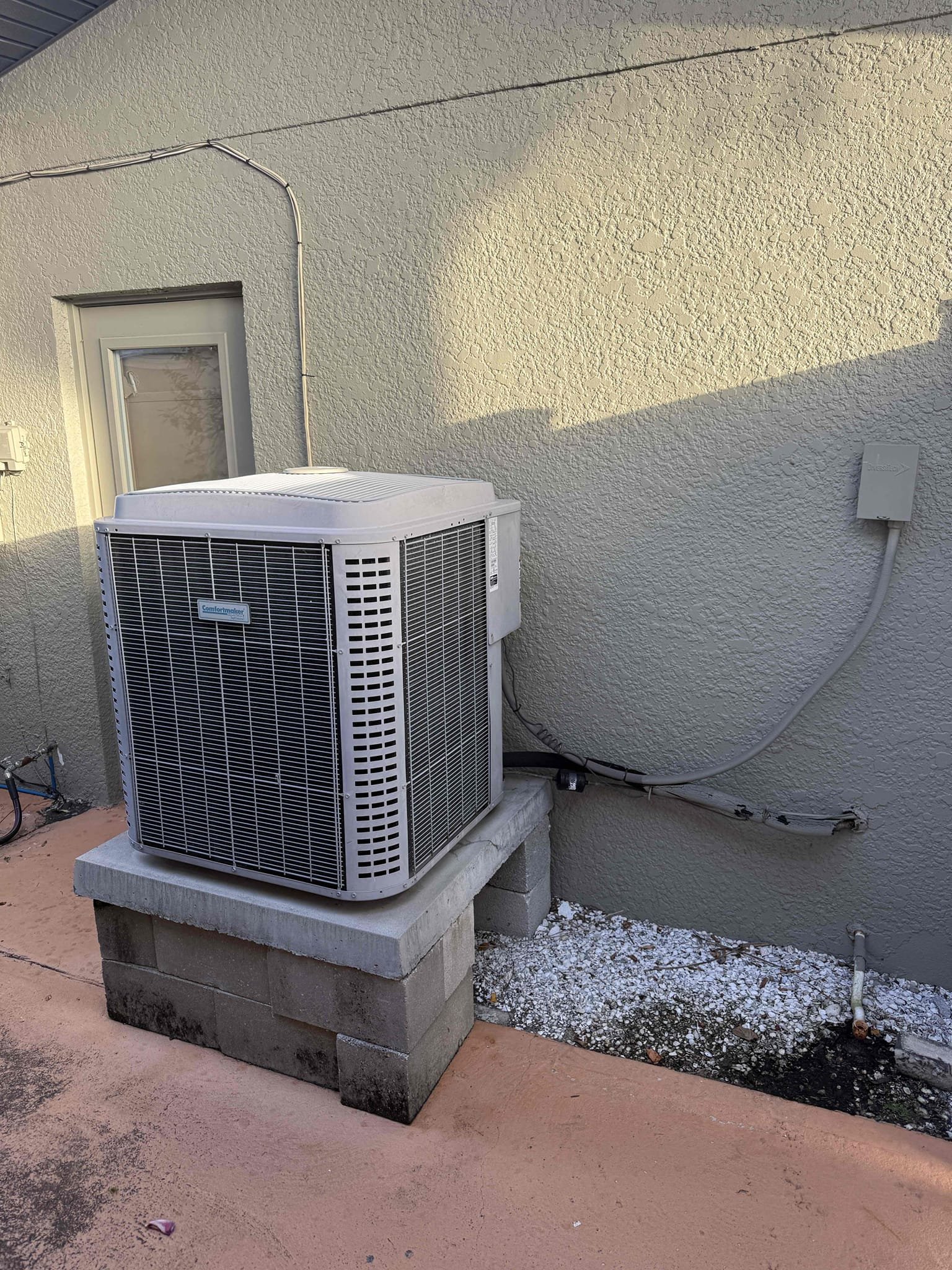 Performed Maitenence on system. Cleaned/treated drain line and primary drain pan. Cleaned condenser coils. Evaporator coils are clean.advised Client that there is no safety float switch installed.  Checked amp draw on compressor. Compressor start up amp draw is 125 amps and is over it max rating. Checked amp draw on fan motor. Checked capacitor is out of factory range. Replaced capacitor. Made sure all connections are tight. System is cooling with a 20° temperature split at this time.  Performed Maitenence on system. Cleaned/treated drain line and primary drain pan. Cleaned condenser coils. Evaporator coils are clean.advised Client that there is no safety float switch installed.  Checked amp draw on compressor. Compressor start up amp draw is 125 amps and is over it max rating. Checked amp draw on fan motor. Checked capacitor is out of factory range. Replaced capacitor. Made sure all connections are tight. System is cooling with a 20° temperature split at this time.